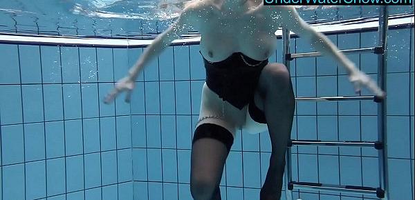  Hot blondie in stockings swims